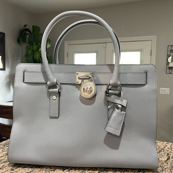 Baby Blue Michael Kors Purse. Never been used.